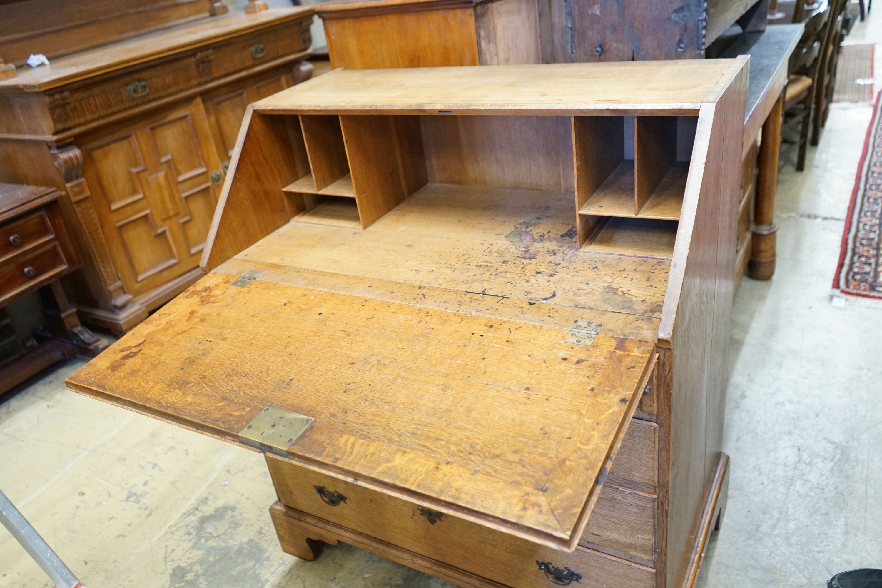 A George III pale oak bureau, width 91cm, depth 54cm, height 105cm